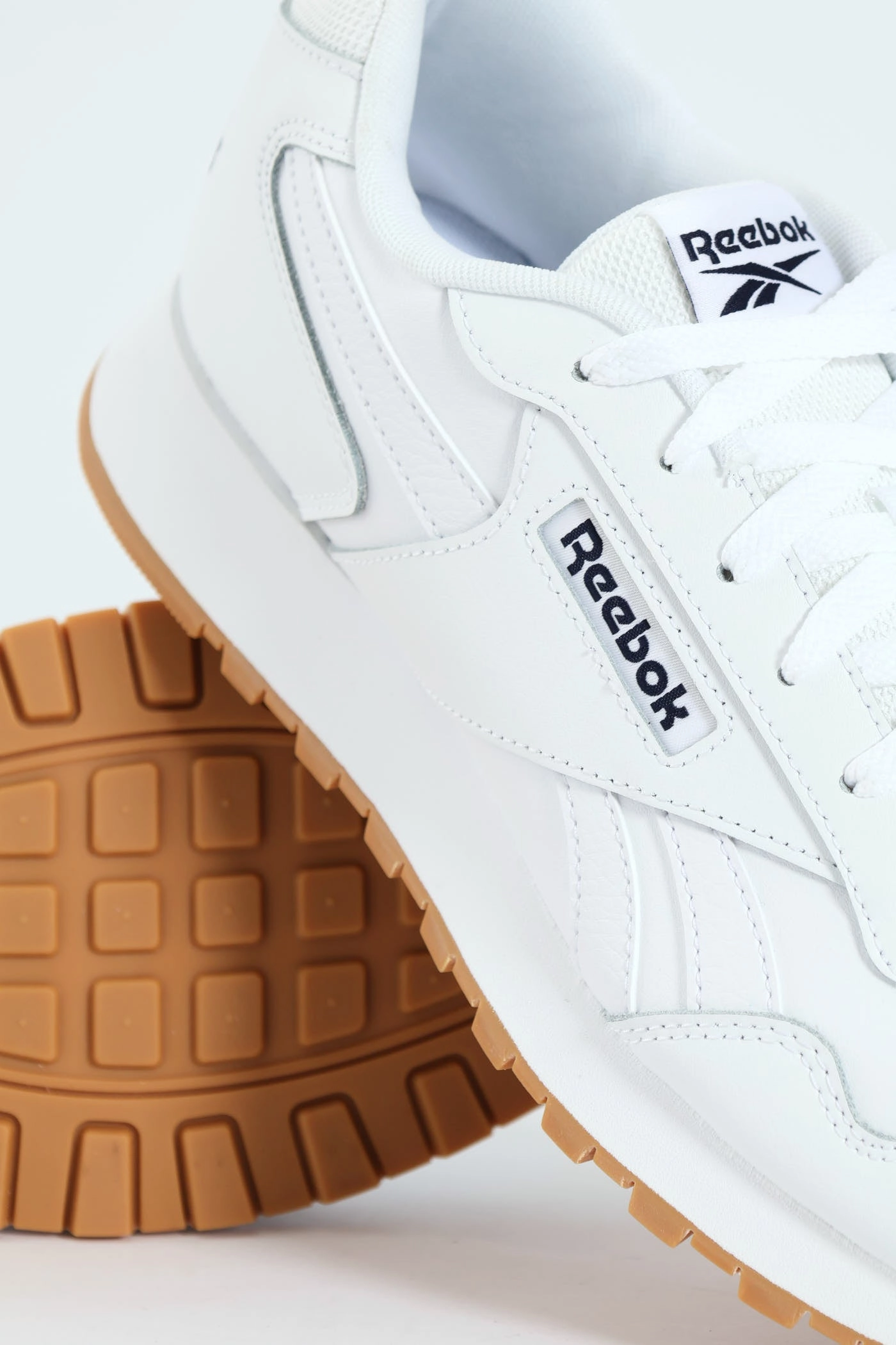 Glide Sneaker - White Freedom Move Hyper Responsive Cushioning